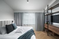 Postel nebo postele na pokoji v ubytování Hotel Klaustur