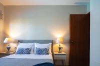 Postel nebo postele na pokoji v ubytování Villa Ligaria, Lygaria