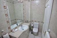 Koupelna v ubytování ViaMar Apartment