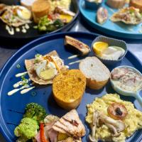 a blue plate filled with different types of food at Mini Summer in Nanwan