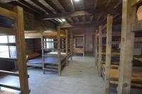 Poschodová posteľ alebo postele v izbe v ubytovaní Albergue la Medina de Camponaraya