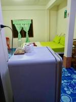 Posezení v ubytování TAMONWAN HOUSE Koh Tao