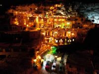 una vista aérea de una ciudad por la noche en Cappadocia Nar Cave House &amp; Swimming Pool, en Nevşehir