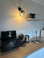 Kuchnia lub aneks kuchenny w obiekcie Studio +++ très agréable en centre ville