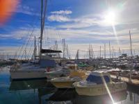 a bunch of boats docked in a harbor at Pavillon de Mer YourHostHelper in Vallauris