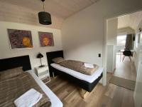 Esehytter Luxury Holiday Home near Beachにあるベッド