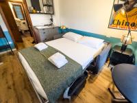 A bed or beds in a room at La Donota
