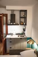 A kitchen or kitchenette at La Donota