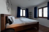 Postel nebo postele na pokoji v ubytování PALAVIA Apartments