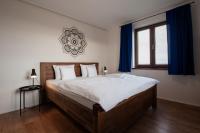 Postel nebo postele na pokoji v ubytování PALAVIA Apartments