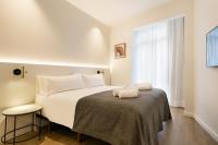 Postel nebo postele na pokoji v ubytování Vale Suites