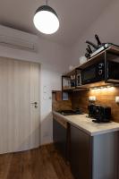 Kuchyň nebo kuchyňský kout v ubytování PALAVIA Apartments