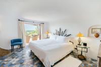 Posteľ alebo postele v izbe v ubytovaní Hotel Pitrizza, Costa Smeralda