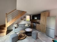 Kuchyňa alebo kuchynka v ubytovaní Résidence hôtelière les hameaux de saint cyprien appartement 2 chambres