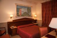Łóżko lub łóżka w pokoju w obiekcie Hotel Palladium Palace