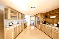 Kuchyň nebo kuchyňský kout v ubytování Villa Luna Suites