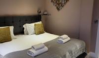Postel nebo postele na pokoji v ubytování Harrogate Lifestyle Luxury Serviced ApartHotel