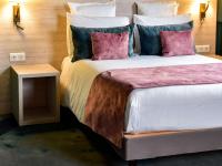 Hôtel Mercure Lyon Centre Charpennes Parc de la Tête d'Orにあるベッド