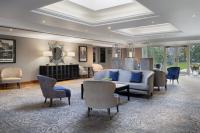 Ein Sitzbereich in der Unterkunft Delta Hotels by Marriott Worsley Park Country Club