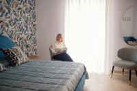 A bed or beds in a room at GARRUBA house 1