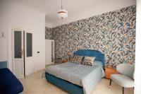 A bed or beds in a room at GARRUBA house 1