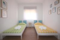 Postel nebo postele na pokoji v ubytování Apartment Jara, Tavira