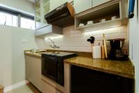 Wall Street Apartments by BnbHostにあるキッチンまたは簡易キッチン