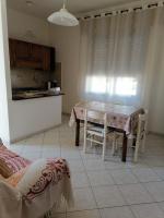 A kitchen or kitchenette at The Garden