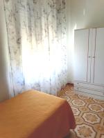 A bed or beds in a room at The Garden