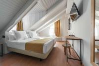 Postel nebo postele na pokoji v ubytování Hotel Viella