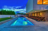Bazén v ubytování Villa am Meer mit Pool & Kinderpool - Leon's Holiday Homes nebo v jeho okolí