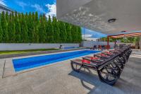 Bazén v ubytování Villa am Meer mit Pool & Kinderpool - Leon's Holiday Homes nebo v jeho okolí