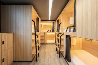 Changsha Desti Youth Park Hostel Wuyi Squareにあるベッド