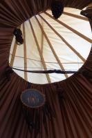 a ceiling of a yurt with a sign on it at Levaltipis in Saint Gatien des Bois