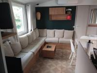 Część wypoczynkowa w obiekcie MOBIL HOME LE LOZERIEN