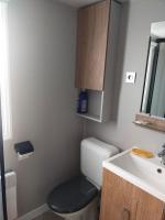 Łazienka w obiekcie MOBIL HOME LE LOZERIEN