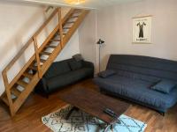 Część wypoczynkowa w obiekcie Charmant appartement au calme avec parking