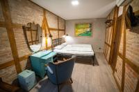 A bed or beds in a room at Guest house Diabora-Veliko Tarnovo