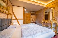 A bed or beds in a room at Guest house Diabora-Veliko Tarnovo