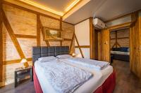 A bed or beds in a room at Guest house Diabora-Veliko Tarnovo