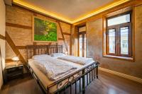 A bed or beds in a room at Guest house Diabora-Veliko Tarnovo
