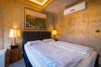A bed or beds in a room at Guest house Diabora-Veliko Tarnovo