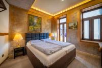 A bed or beds in a room at Guest house Diabora-Veliko Tarnovo