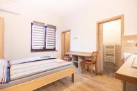 Postel nebo postele na pokoji v ubytování Penzion pod Kozákem