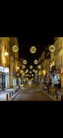 an empty city street at night with lights at SSP Suites- Cosy &amp; Bel appartement 4 pièces 3 chambres 90M2 avec balcon in Épinay-sur-Seine