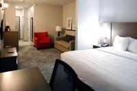 Ein Bett oder Betten in einem Zimmer der Unterkunft Country Inn &amp; Suites by Radisson, Council Bluffs, IA