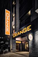 an orange sign on the side of a building at Orange Hotel -Hanzhong, Taipei in Taipei