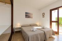 Posteľ alebo postele v izbe v ubytovaní Apartamentos Casa del Sol