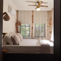 Cama o camas de una habitaci&oacute;n en Villa Citronella Boutique Hotel