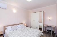 Posteľ alebo postele v izbe v ubytovaní Apartments Lena & Lara